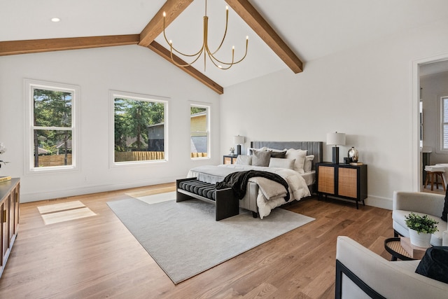 bedroom with vaulted ceiling with beams, an inviting chandelier, and light hardwood / wood-style flooring