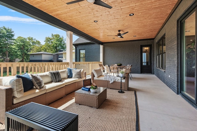 view of patio with ceiling fan and an outdoor hangout area