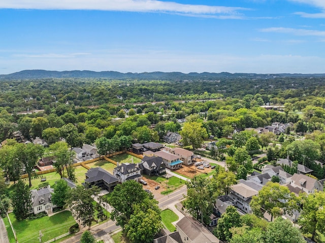 drone / aerial view featuring a mountain view