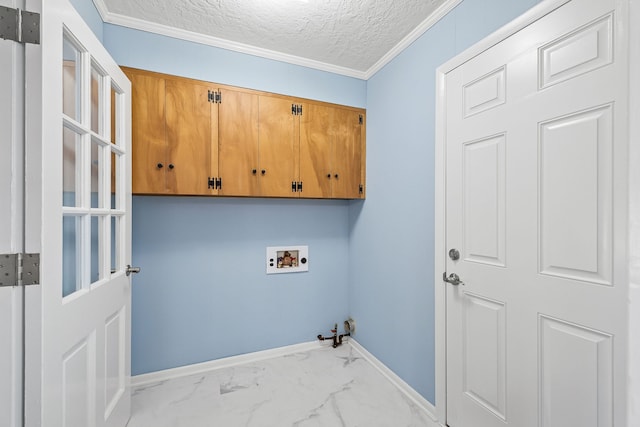 laundry area with cabinets, washer hookup, a textured ceiling, hookup for a gas dryer, and ornamental molding