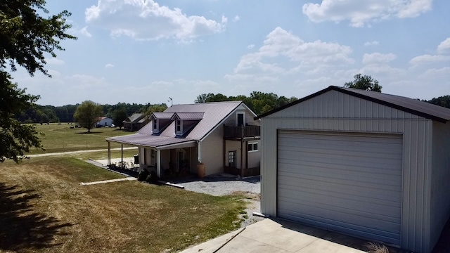 exterior space with a front yard and a garage