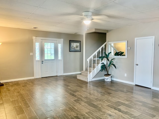 foyer entrance featuring ceiling fan and hardwood / wood-style flooring