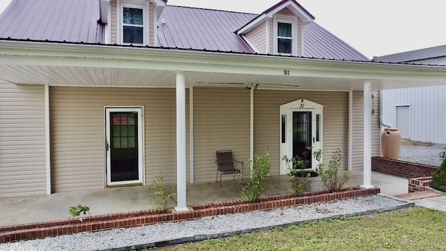 property entrance featuring a patio