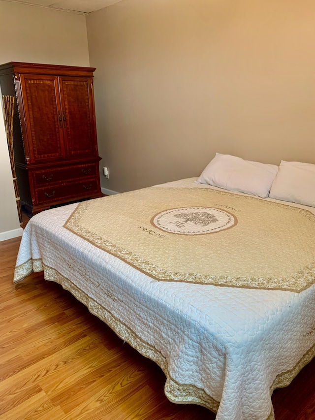 bedroom featuring light wood-type flooring