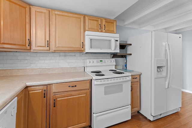 kitchen featuring light brown cabinets, light wood-type flooring, tasteful backsplash, and white appliances