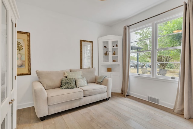 living room featuring light wood-type flooring