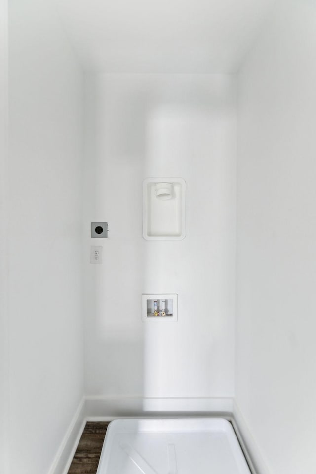 320 Moffat St Unit 102, Monteagle, TN 37356 - washroom with hookup for an electric dryer, baseboards, dark wood finished floors, and hookup for a washing machine