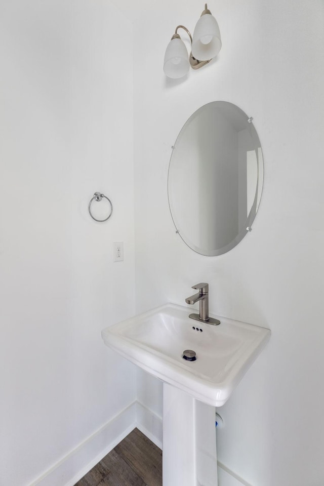 320 Moffat St Unit 102, Monteagle, TN 37356 - bathroom featuring a sink, baseboards, and wood finished floors