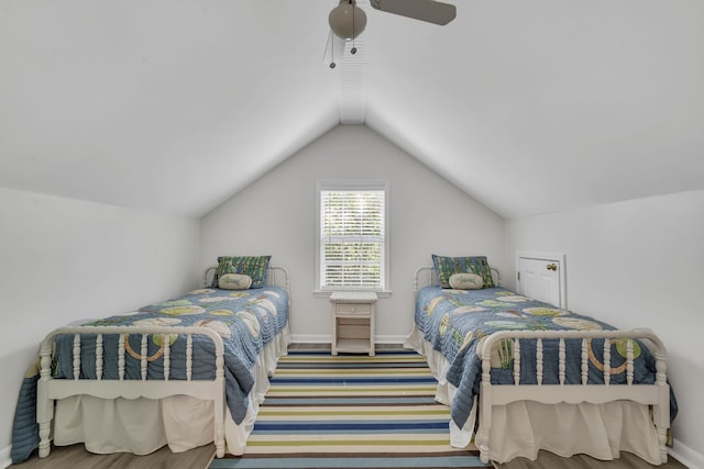 bedroom featuring lofted ceiling and ceiling fan