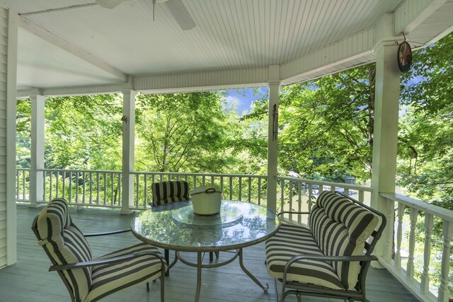 wooden deck with ceiling fan