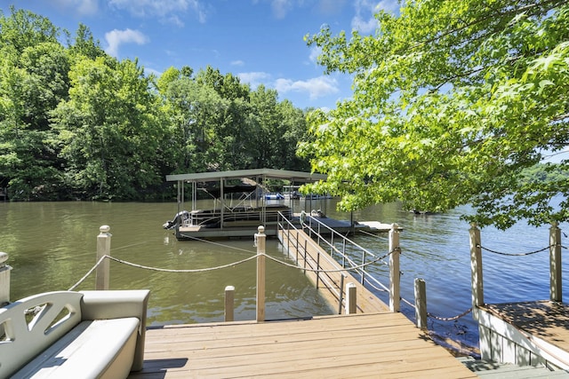 dock area featuring a water view