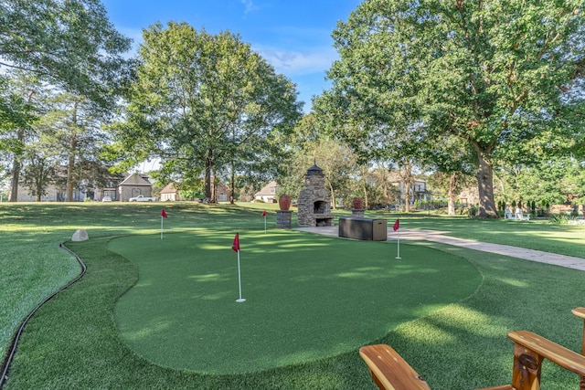 view of home's community with a lawn