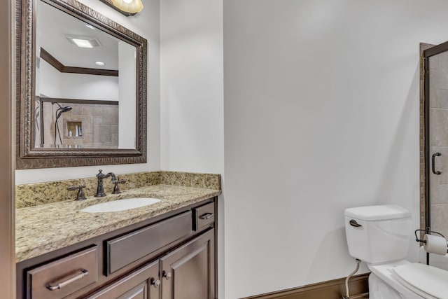 bathroom featuring walk in shower, vanity, and toilet