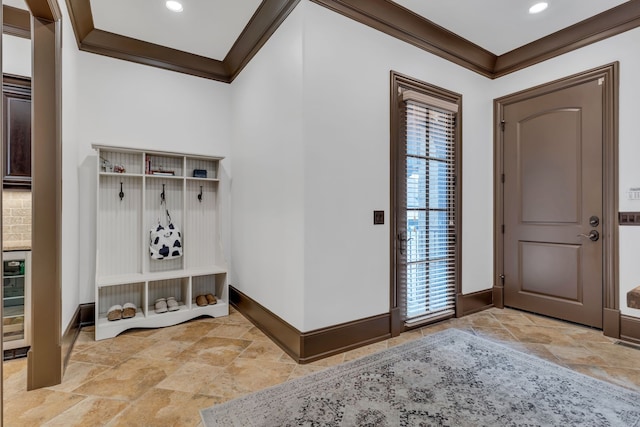 entrance foyer featuring crown molding