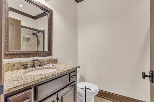 bathroom featuring a shower with door, tile patterned floors, crown molding, vanity, and toilet