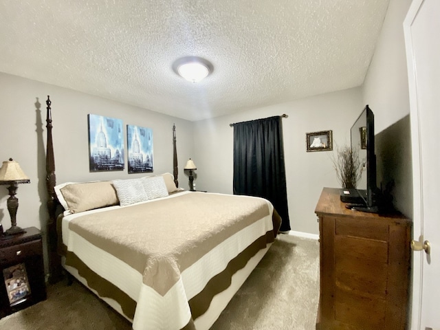 carpeted bedroom with a textured ceiling