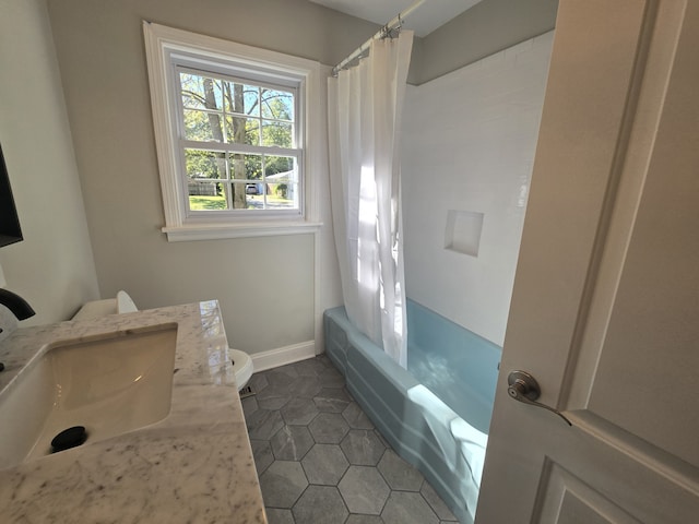 full bathroom featuring shower / bathtub combination with curtain, tile patterned flooring, vanity, and toilet