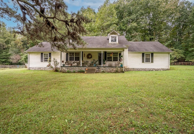 view of front facade featuring a front lawn and covered porch