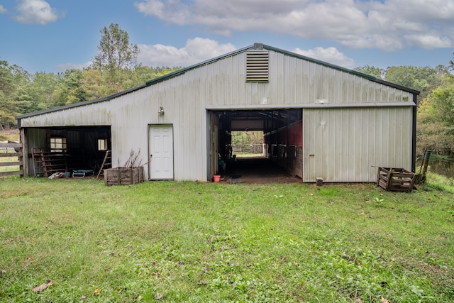 view of outdoor structure with a yard