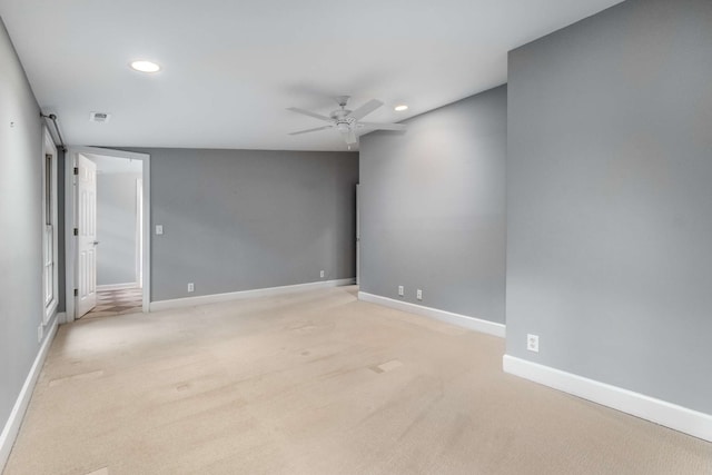 carpeted empty room with ceiling fan