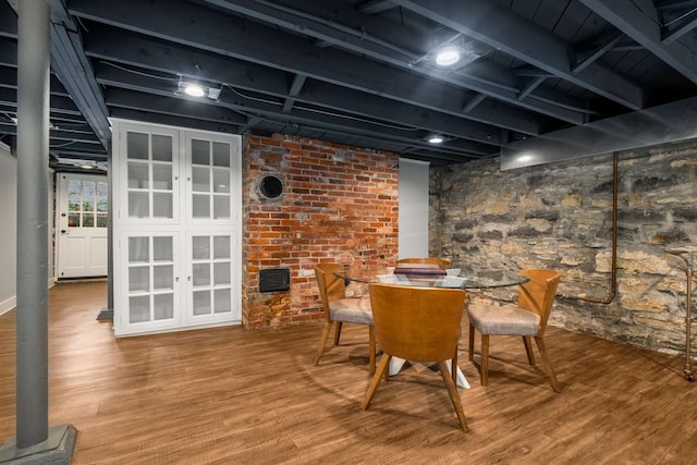 dining area with hardwood / wood-style floors