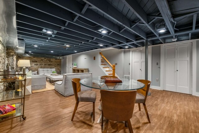 dining room with wood-type flooring