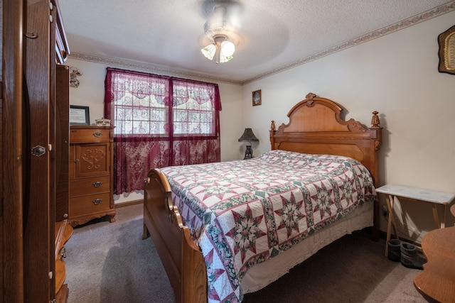 bedroom with ornamental molding, ceiling fan, carpet flooring, and a textured ceiling