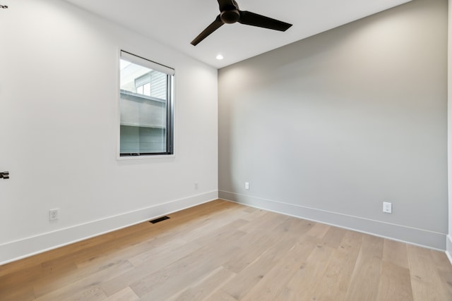 spare room featuring visible vents, baseboards, a ceiling fan, light wood-style flooring, and recessed lighting