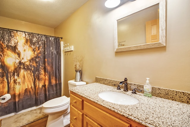 bathroom featuring vanity, a textured ceiling, toilet, a shower with shower curtain, and hardwood / wood-style floors