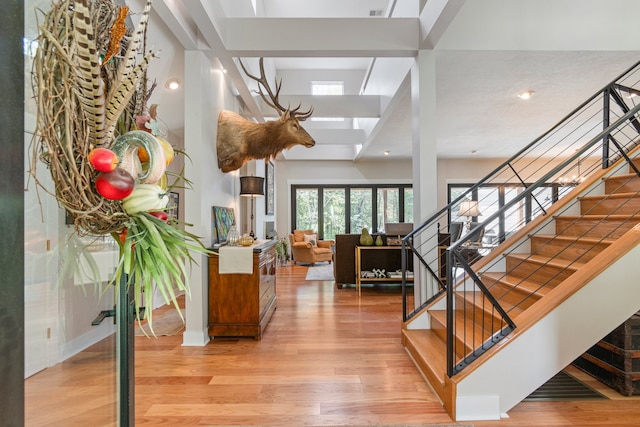 staircase featuring hardwood / wood-style floors