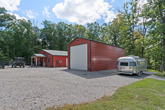 view of outbuilding with a garage