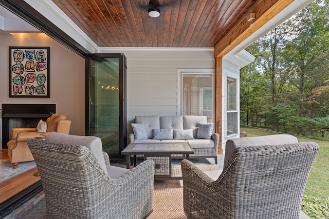 view of patio featuring a wooden deck and an outdoor hangout area