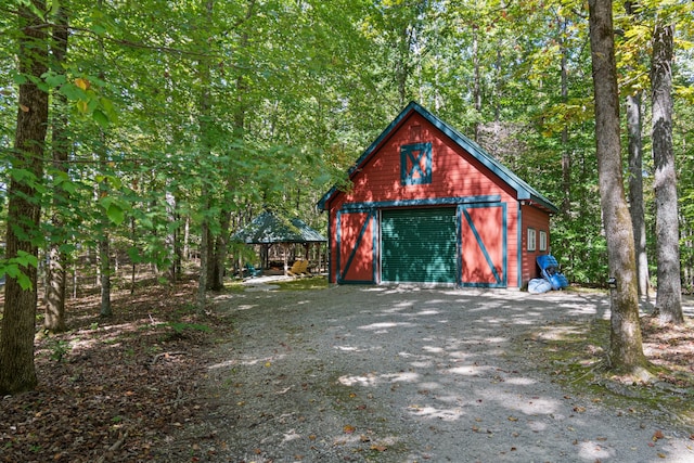 view of outbuilding with a garage