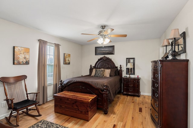 bedroom with light wood-type flooring and ceiling fan