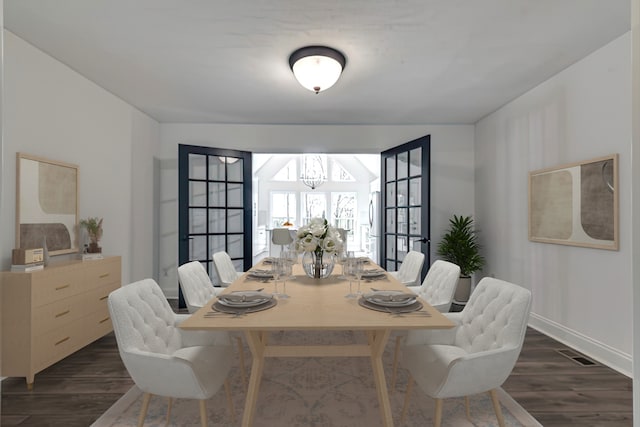 dining room with dark hardwood / wood-style floors