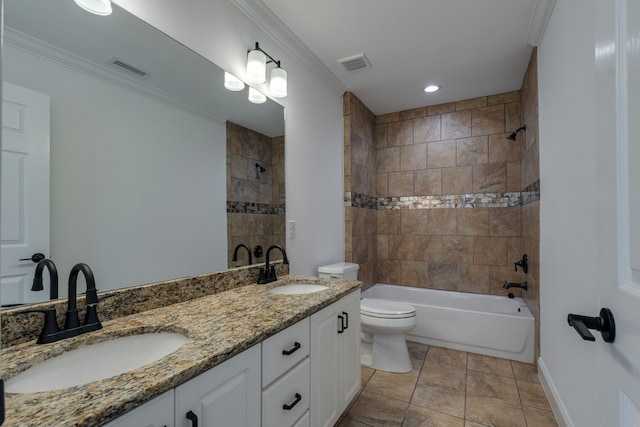 full bathroom with vanity, tiled shower / bath combo, ornamental molding, tile patterned flooring, and toilet