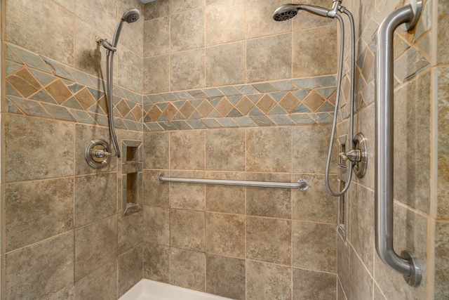 details with a tile shower