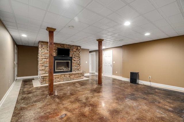 basement featuring a paneled ceiling