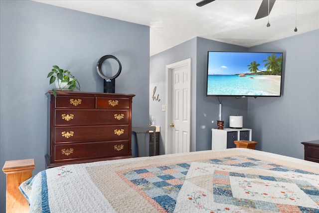 bedroom with ceiling fan and hardwood / wood-style floors