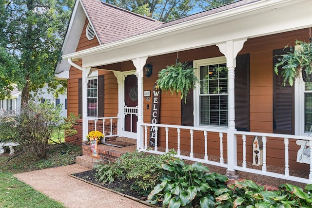 doorway to property with a porch