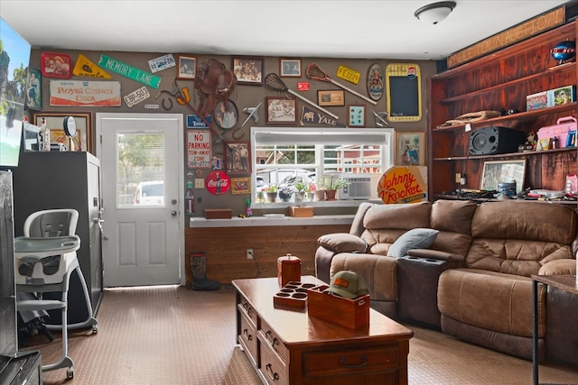 carpeted living room featuring a wealth of natural light