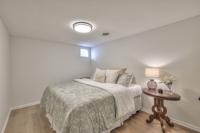 bedroom with light hardwood / wood-style flooring