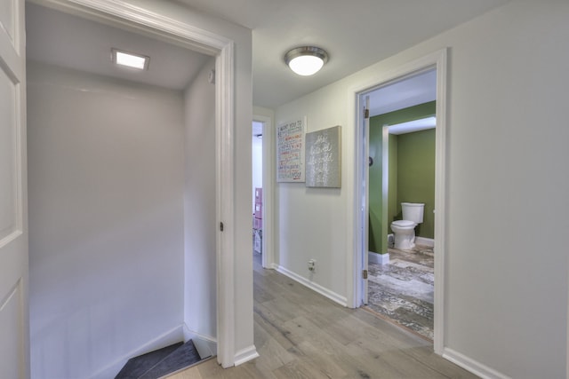 corridor featuring light hardwood / wood-style flooring