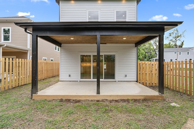 rear view of house with a patio area