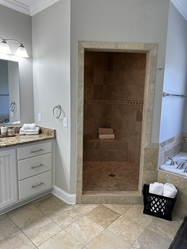 bathroom featuring crown molding, vanity, separate shower and tub, and tile patterned floors