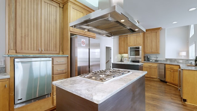 kitchen featuring ventilation hood, appliances with stainless steel finishes, dark hardwood / wood-style flooring, and a center island