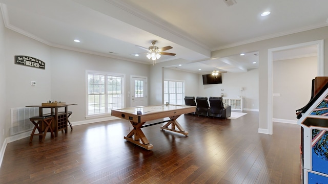 playroom featuring ceiling fan, beam ceiling, crown molding, and dark hardwood / wood-style flooring