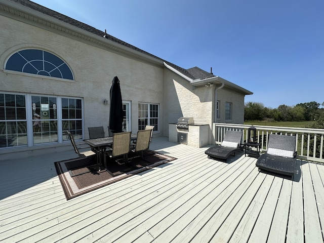 deck featuring grilling area