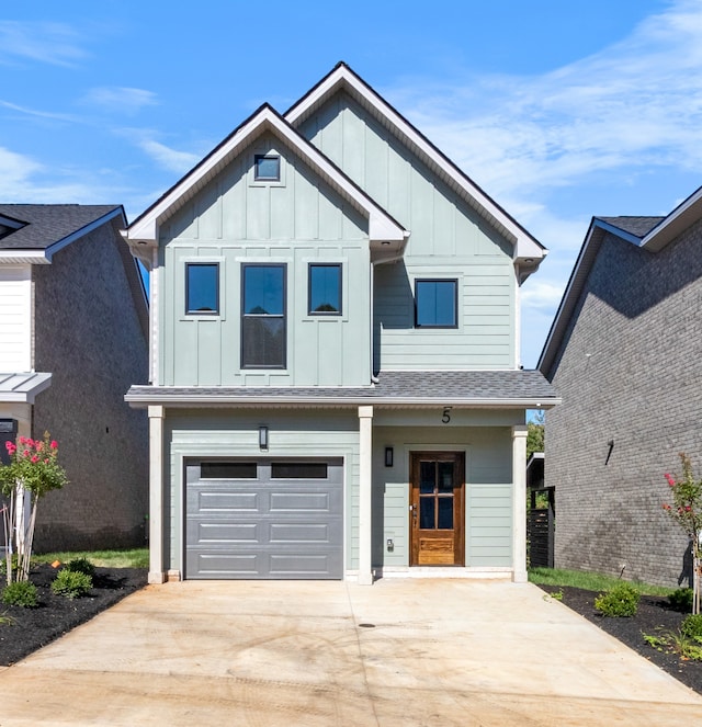 view of front of property with a garage