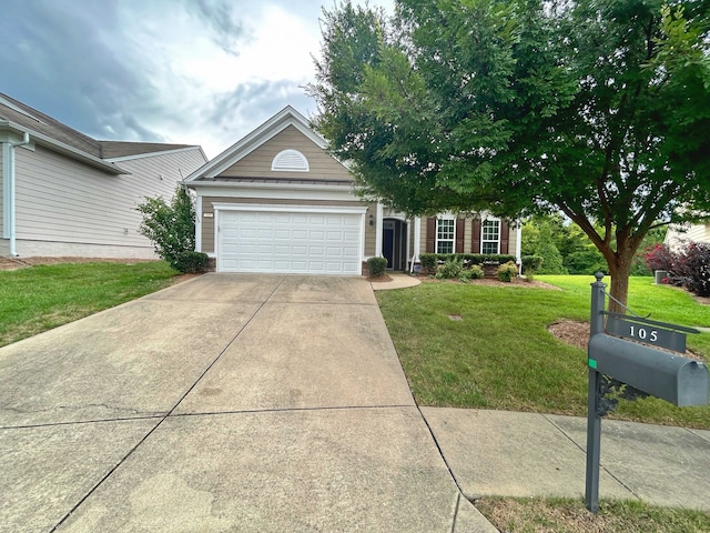 view of front facade featuring a garage and a front lawn